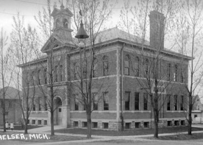 Vintage photograph of the original St. Mary's School in Chelsea, MI, opened in 1907.